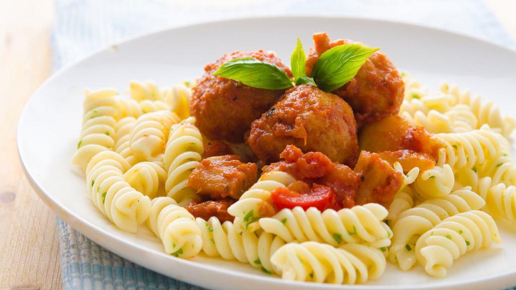 Meatball Tri-Color  Pasta · Fresh beef meatballs mixed with tri-color pasta and choice of sauce.