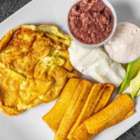 Huevos Con Tomate / Eggs With Tomato · Frijoles, queso, crema, aguacate y plátano. / Beans, cheese, sour cream, avocado and plantain.