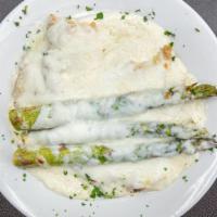 Chicken Montebianco · Chicken breast with asparagus and mozzarella cheese in a creamy sauce. Served with a side of...