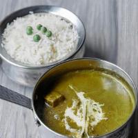 Saag Paneer · Cottage cheese cubes, cooked in spinach curry with garam masala. Served with flavored basmat...