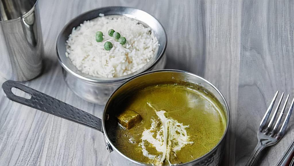 Saag Paneer · Cottage cheese cubes, cooked in spinach curry with garam masala. Served with flavored basmati rice.