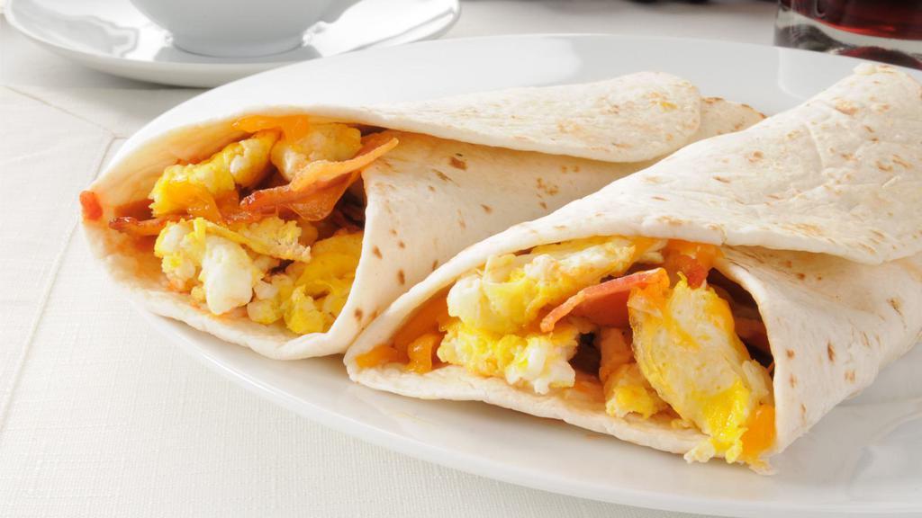 American Burrito · Delicious 2 eggs, cheddar cheese, and sour cream.