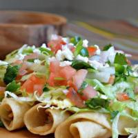 Flautas · 4 crispy tacos perfectly cooked. Options of meat; seasoned chicken, beef or veggie. Topped s...