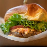 Lamburger · All natural 100% fresh lamb, lettuce, tomato, with roasted pepper and feta cheese sauce. Add...