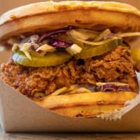 Chicken Waffle Sandwich · Krispy chicken, pickles, house slaw w/ chipotle mayo, side of maple syrup.