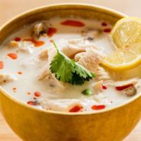 Tom Kha · Gluten-free. Choose either chicken, shrimp, vegetables, or tofu. Creamy coconut milk, lemong...