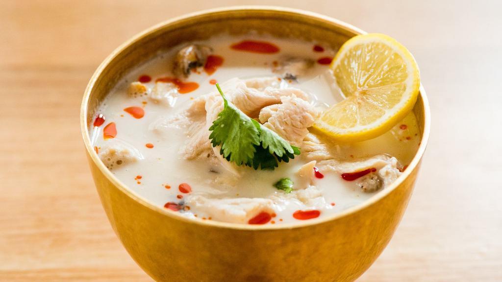 Tom Kha · Gluten-free. Choose either chicken, shrimp, vegetables, or tofu. Creamy coconut milk, lemongrass and galangal broth, mushrooms, scallions, and cilantro.