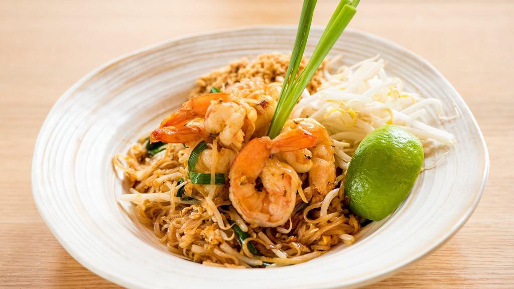 Pad Thai · Gluten-free. Traditional Thai dish of stir fried thin rice noodles, Chinese chives, bean sprouts, crushed peanuts and egg in savoury and sweet tamarind sauce.