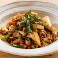 Pad Kee Mao (Drunken Noodle) · Gluten-free, spicy level 1. Stir fried broad flat rice noodles, onions, tomatoes, bell peppe...