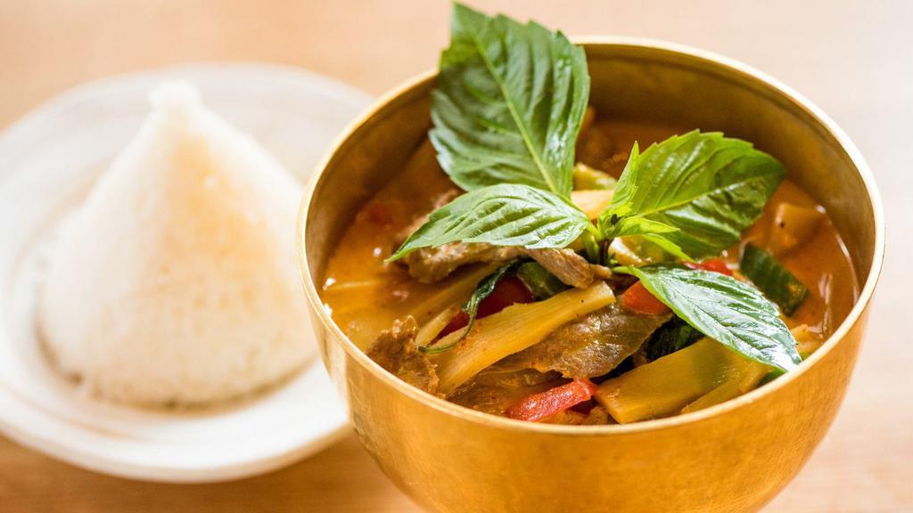 Red Curry · Spicy level 2. Bell peppers, bamboo shoots, Thai basil, in creamy coconut and red chili curry sauce.  ** CANNOT BE MADE VEGAN OR GLUTEN FREE **
