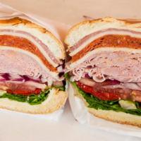 Godfather Sandwich · Genoa salami, ham, pepperoni, provolone cheese, onions, roasted peppers, lettuce, tomato and...