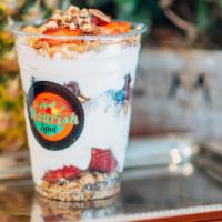 Yogurt Parfaits Cup · Vanilla Greek yogurt, granola, and your choice of two items between fruit, nuts, and seeds.