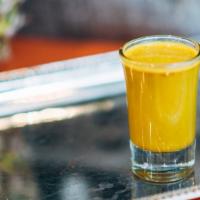 Turmeric · Comes with shot of a juice or slice of citrus fruit