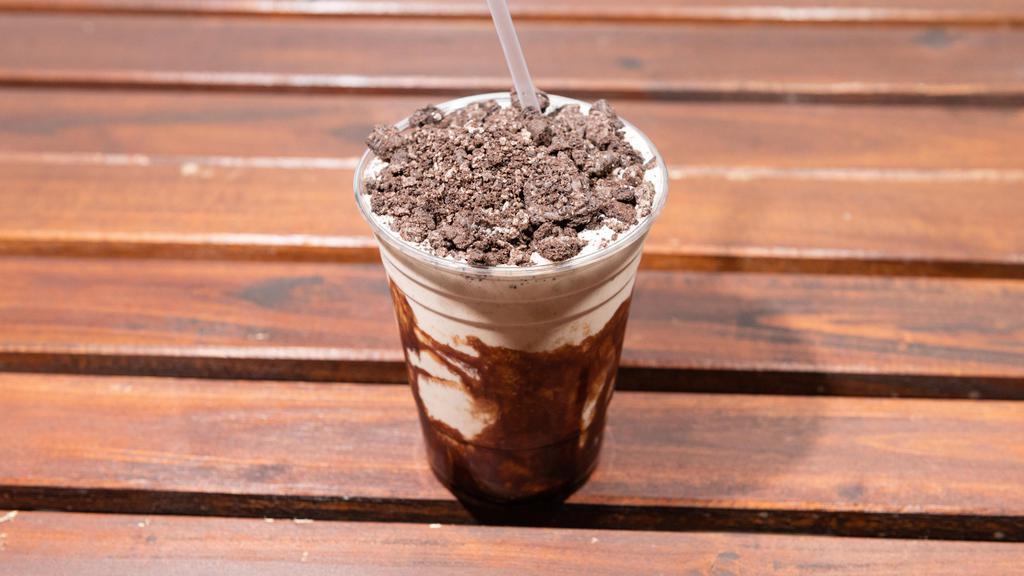 Oreo Overload · 3 Scoops of Oreo Ice Cream, mixed in with oreo pieces , hersey fudge, your choice of milk, topped with whipped cream, sprinkles and a cherry on top.