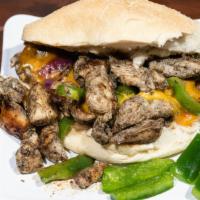 Jerk Chicken Philly · Deliciously grilled jerk chicken on a hero bun, with your choice of mayo, lettuce, sautéed g...