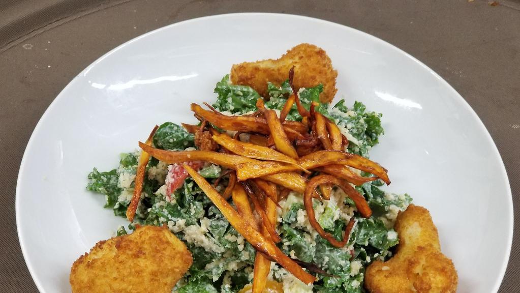 Bulgur Salad · A Delicious Combination of Kale, Bulgur Wheat, Cucumbers, Tomatoes, Red Beets, Red Onions, Fresh Herbs, Sweet Potato Chips, and Feta Ranch Dressing.