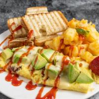 Monterey Omelette · Served with scrambled eggs, bacon, avocado and pepper jack cheese. Served with home fries an...