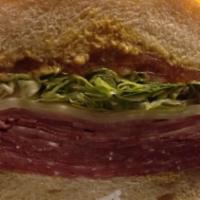 Italian Combo No. 2 Sandwich · Ham, salami, pepperoni, provolone cheese, lettuce, tomatoes and Italian dressing.