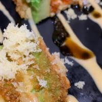 Crunchy Lava · Cubes of crunchy deep fried rice, topped with our signature guacamole, spicy kani, and drizz...