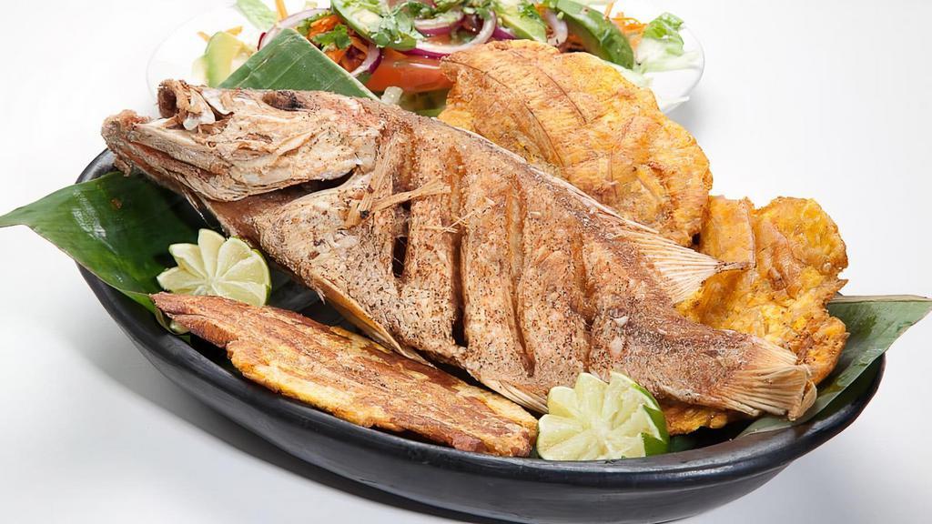 Fried Red Snapper · Served with rice and salad.