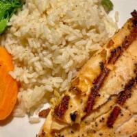 Ginger Salmon · Grilled salmon topped with sesame ginger sauce served with vegetables and rice.