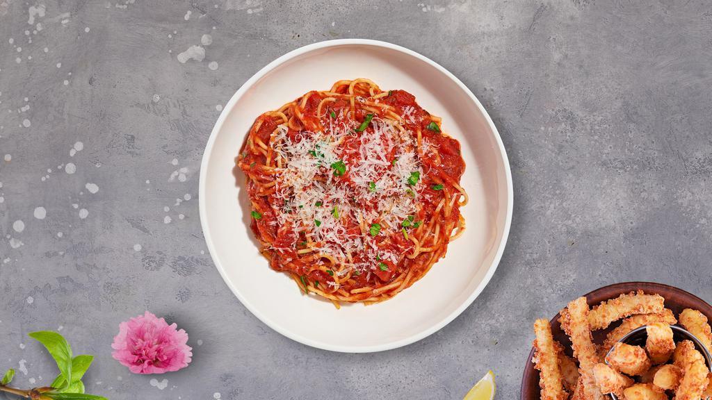 Classic Vegan Spaghetti · Spaghetti with marinara and melted vegan cheese.