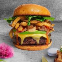 Eyes On The Fries Vegan Burger · Seasoned Impossible burger patty topped with fries, avocado, melted vegan cheese, onion, let...