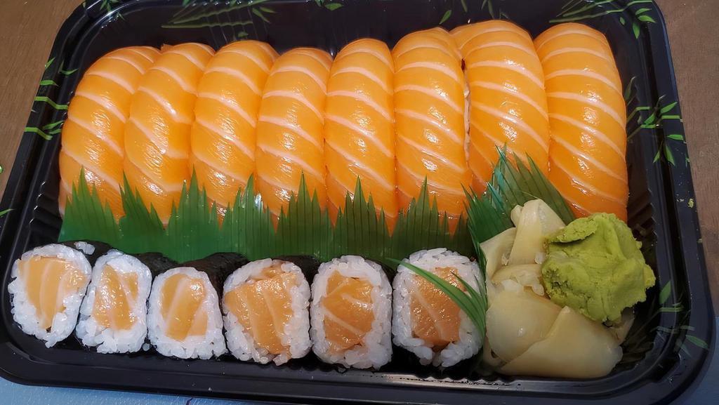 Salmon Girl · Eight pieces of salmon sushi and a spicy salmon roll.