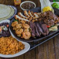 Mixed Grill  · Grilled chicken and steak, mexicampi shrimp and slow-roasted carnitas