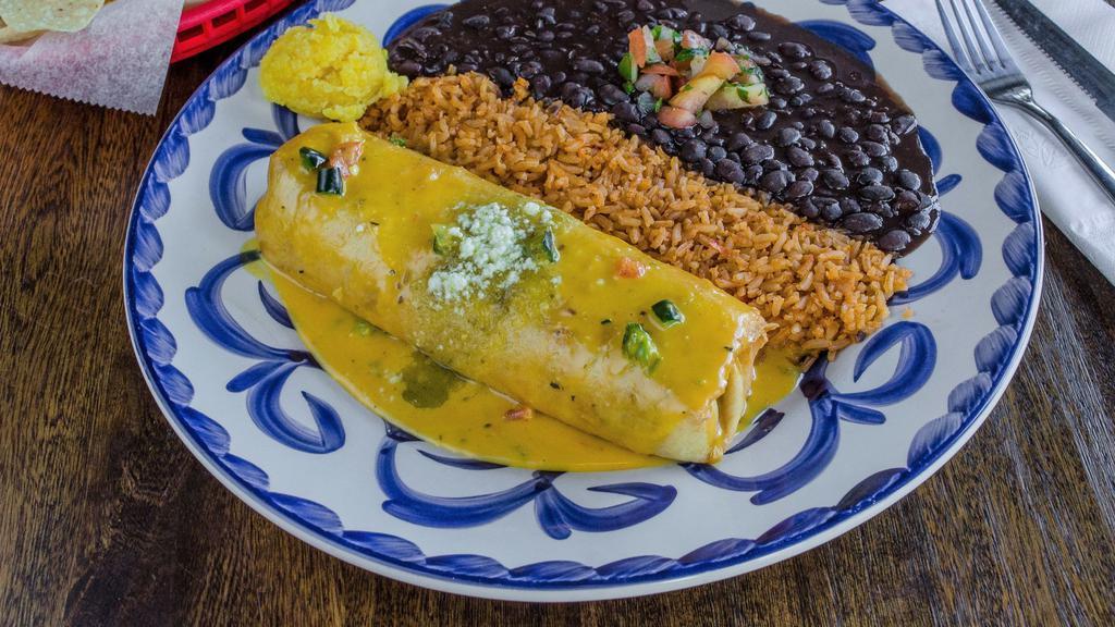Chimichanga · Stuffed with beef or chicken, cheese, black beans, and pico de gallo and smothered with queso. Deep-fried in a flour tortilla and topped with chile con queso. Chicken 1510 Cal - Beef 1450 Cal.
