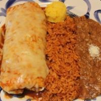 Smothered Burrito · Chicken or beef, cheese, black beans, and
pico de gallo smothered with red sauce. Chicken 90...