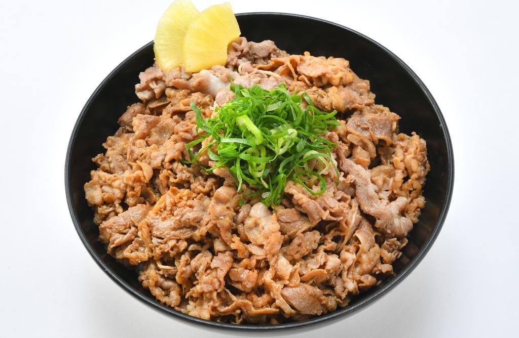 Yakiniku Bowl · This item consists of shredded beef that's been mixed with our yakiniku sauce over rice topped with green onions and pineapples.