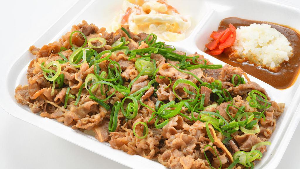Double Combo · This item is similar to the #1, shredded beef over a bed of rice topped with green onions, but you get sides of curry with rice along with macaroni salad.