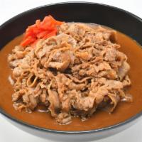 Curry The Rock · Curry and rice topped with shredded beef and our red pickled radish.

*Curry is a little on ...