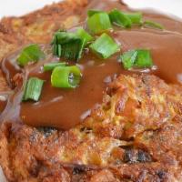 Roast Pork Egg Foo Young · Served with rice.