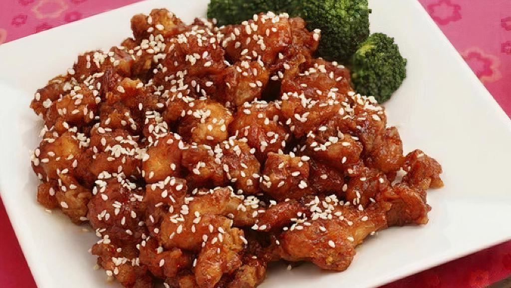 Sesame Chicken · Fried tender chicken served with broccoli in sesame sauce. Served with white or brown rice.