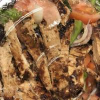 Grilled Chicken Salad · Boneless breast of chicken served on top of mixed salad with a choice of dressing.