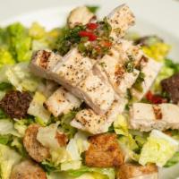 Caesar Salad (Chiken) · Ensalada de lechuga romana, queso parmesano, crotones y Caesar dressing. Add pollo (chicken)...