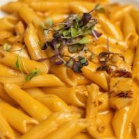 Penne Alla Vodka / Vodka Penne · Served with the side of your choice. Add camarones (shrimp) for an additional charge.