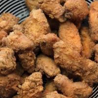 Bone-Out  Wings (24) · Breaded tender all-white meat chicken, deep-fried to perfection and tossed in your choice of...