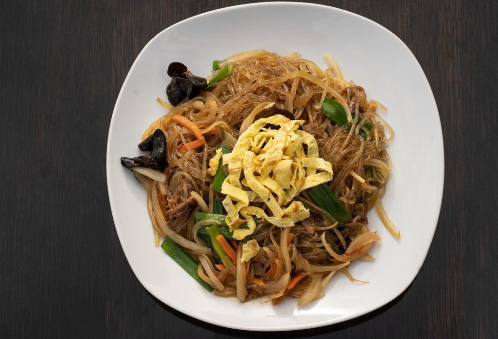 Japchae · Stir-fried sweet potato glass noodles with vegetables and beef.
