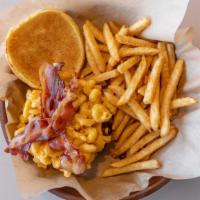 Mac N Cheese Burger · Melted American cheese burger piled with our homemade mac n cheese with bacon .