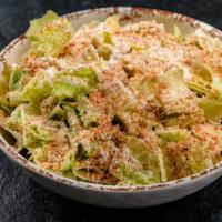 Caesar Salad · Chopped romaine lettuce, house-made Caesar dressing, toasted bread crumbs, and Parmesan chee...