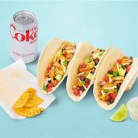 Taco Combo · Includes 1 order of Tacos, tortilla chips + choice of dip, choice of canned beverage. 720-94...