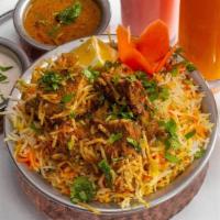 Lamb Boneless Biryani · Boneless lamb flavored with exotic spices and cooked with basmati rice.