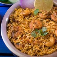 Shrimp Biryani · Shrimp cooked in basmati rice with special herbs and spices.