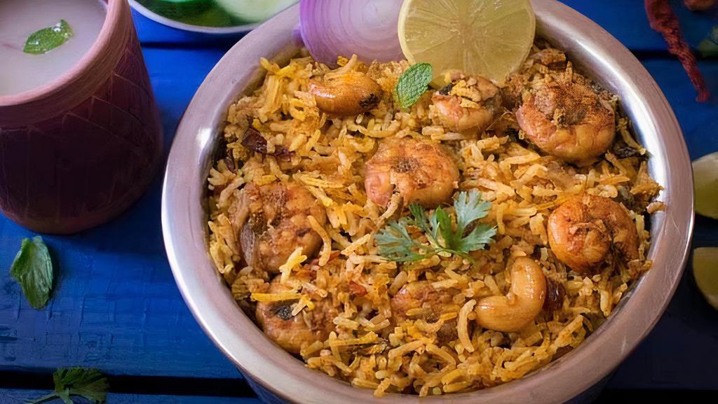 Shrimp Biryani · Shrimp cooked in basmati rice with special herbs and spices.