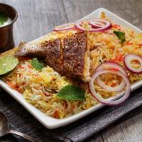 Fish Biryani · Fish cooked in basmati rice with special herbs and spices.