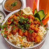 Gobi Manchurian Biryani · Marinated fresh cauliflower florets and layered cooked with special secret spices and basmat...