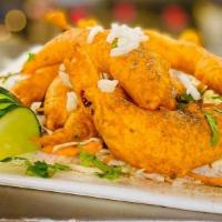 Mirchi Bhajji · Mirchi coated with a mixture of spices, gram flour and batter fried.